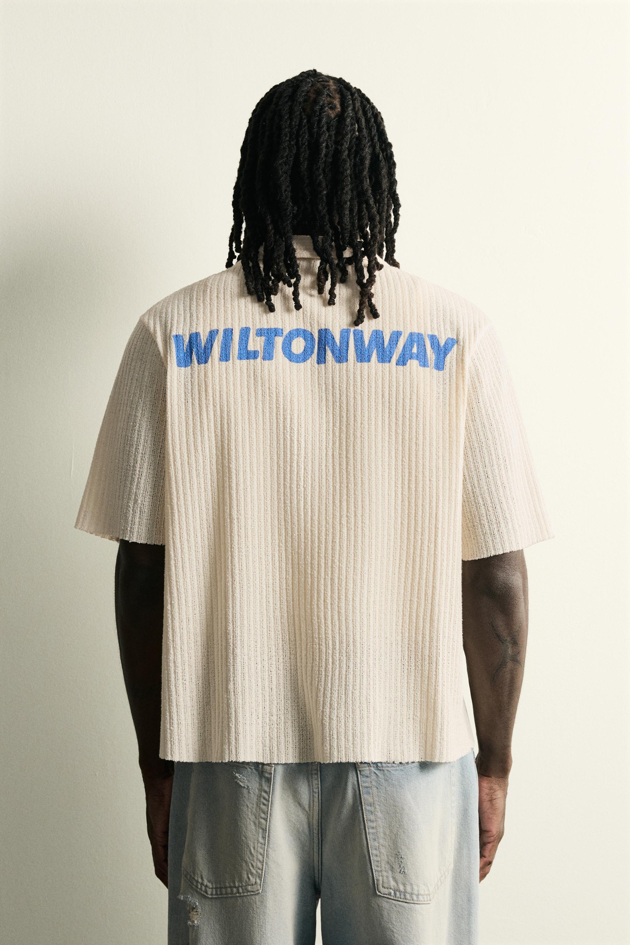 CHEMISE STRUCTURÉE AJOURÉE À INSCRIPTION IMPRIMÉE